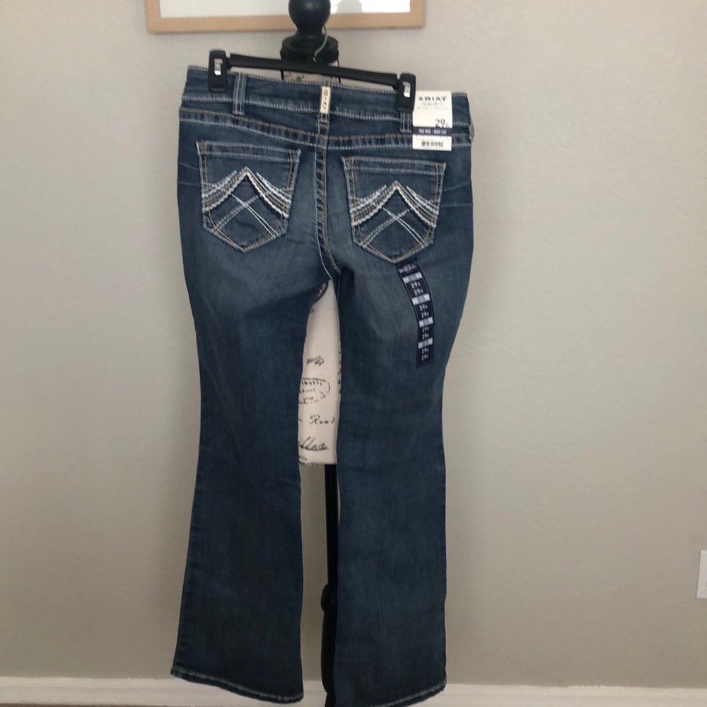 Ariat mid wash boot  cut jeans